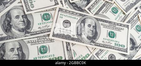 Panorama of Texture US dollars. Background of one hundred dollar bills. Stock Photo