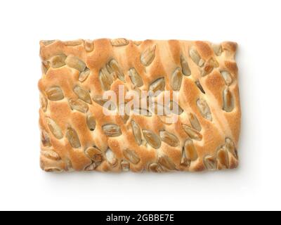 Top view of crispy cracker with sunflower seeds isolated on white Stock Photo