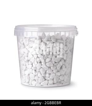 White decorative marble chips in plastic bucket isolated on white Stock Photo
