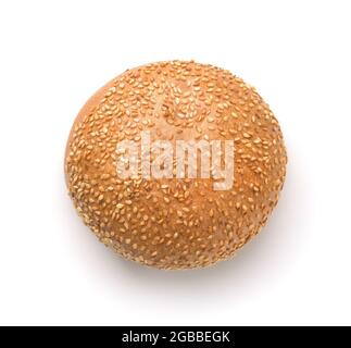 Top view of fresh round sesame seed burger bun isolated on white Stock Photo