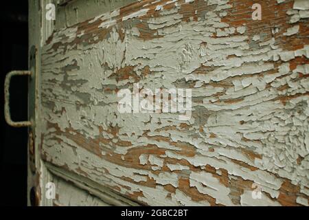 Peeling paint of an old door. High quality photo Stock Photo