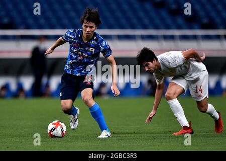 SAITAMA, JAPAN - AUGUST 3: Ao Tanaka of Japan and Carlos Soler of Spain during the Tokyo 2020 Olympic Mens Football Tournament Semi Final match between Japan and Spain at Saitama Stadium on August 3, 2021 in Saitama, Japan (Photo by Pablo Morano/Orange Pictures) Stock Photo