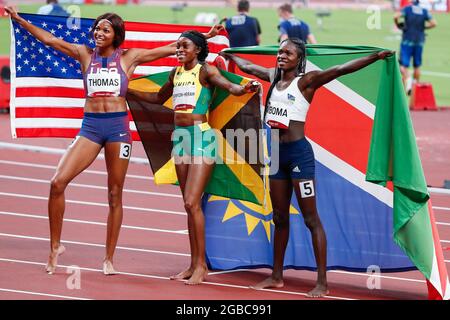 From left Women's 200m bronze medalist Gabrielle Thomas of the United States, gold medalist Elaine Thompson-Herah of Jamaica, and silver medalist Christine Mboma of Namibia pose for a photo while celebrating their medal wins at Olympic Stadium during the 2020 Summer Olympics in Tokyo, Japan on Tuesday, August 3, 2021. Elaine Thompson-Herah of Jamaica took gold with a time of 21.53 while Christine Mboma of Namibia took silver with a time of 21.81 and Gabrielle Thomas of the United States took bronze with a time of 21.87. Photo by Tasos Katopodis/UPI Stock Photo