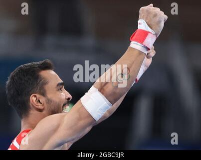 Tokyo, Japan. 3rd Aug, 2021. Ferhat Arican of Turkey celebrates after the artistic gymnastics men's parallel bars final at the Tokyo 2020 Olympic Games in Tokyo, Japan, Aug. 3, 2021. Credit: Zheng Huansong/Xinhua/Alamy Live News Stock Photo