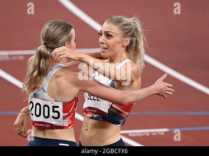 Tokyo, Japan. 3rd Aug, 2021. Keely Hodgkinson (L) of the Great Britain hugs her teammate Alexandra Bell after the Women's 800m Final at the Tokyo 2020 Olympic Games in Tokyo, Japan, Aug. 3, 2021. Credit: Li Yibo/Xinhua/Alamy Live News Stock Photo