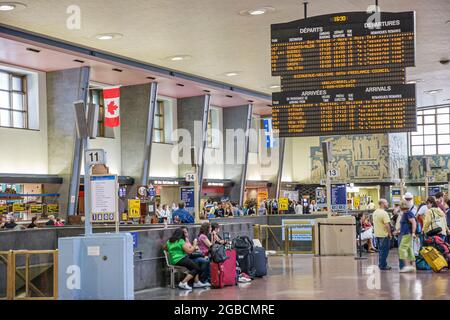 Canada Quebec Province Montreal Gare Centrale Central Train Station,schedule ticketing passengers riders arrivals departures French language, Stock Photo