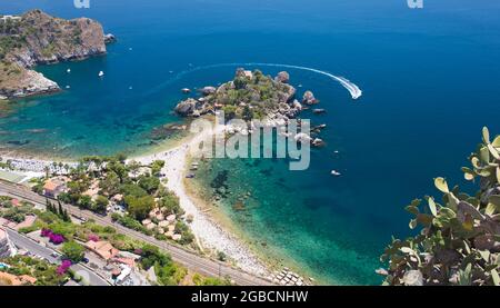 Taormina, Messina, Sicily, Italy. Spectacular clifftop view over the Ionian Sea off Mazzarò and the tiny island nature reserve of Isola Bella. Stock Photo