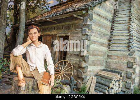 Illinois Springfield Abraham Lincoln Presidential Museum inside interior,life-size life-like statue young Abe log cabin, Stock Photo