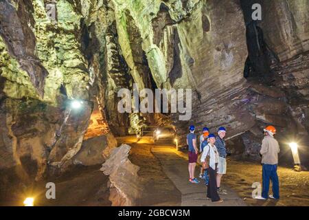 Johannesburg South Africa,Muldersdrift Sterkfontein Caves,hominin hominid site Cradle of Humankind cave interior inside,Black African guide group look Stock Photo