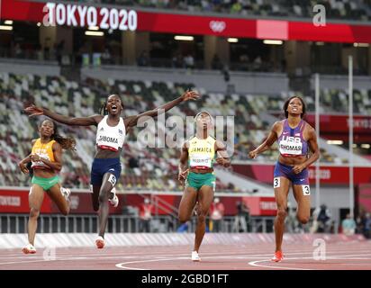 Tokyo, Japan. 03rd Aug, 2021. Silver medalist from Namibia Christine Mboma (2nd L) celebrates as she crosses the finish line with bronze medalist Gabrielle Thomas of the USA (R), Jamaica's Shelly-Ann Fraser-Pryce (2nd R) and Marie-Josee Ta Lou from the Ivory Coast in the Women's 200m at the Athletics competition during the Tokyo Summer Olympics in Tokyo, Japan, on Tuesday, August 3, 2021. Jamaica's Elaine Thompson-Herah took the gold medal, her second after winning the Women's 100m. Photo by Bob Strong/UPI. Credit: UPI/Alamy Live News Stock Photo