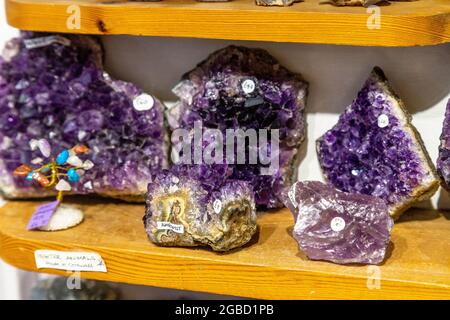 Display of amethyst crystals at Emjems crystal and gem shop, St Ives, Cornwall, UK Stock Photo