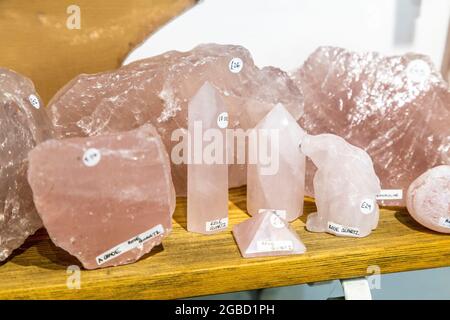 Selection of rose quartz at Emjems crystal and gem shop, St Ives, Cornwall, UK Stock Photo