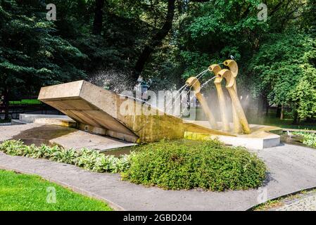 Krakow, Poland - August 28, 2018: Fontanna Fryderyka Chopina (Chopin's Piano Water Fountain), a sculpture in Planty Park, Krakow, Poland Stock Photo