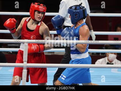 Tokyo, Kanto, Japan. 3rd Aug, 2021. Finland Olympic Team's only medal winner in 2016 Rio games, is repeating as a medal winner in 2020 Tokyo games. 'Boxer Mum' aka MIRA MARJUT JOHANNA POTKONEN, 40, edging out younger rival Turkey's ESRA YILDIZ, 24, who could be her daughters age, in a win by points 3-2 during the quarterfinal match for Women's Light (57-60kg) Boxing at the 2020 Tokyo Summer Olympics. Potkonen will face Brazil's B. Ferreira in the semifinals Thursday. Mira will be oldest lady boxer to win a medal. (Credit Image: © Scott Mc Kiernan/ZUMA Press Wire) Stock Photo