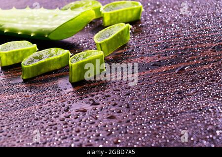 Aloe Vera slice on table with Water Drops Stock Photo
