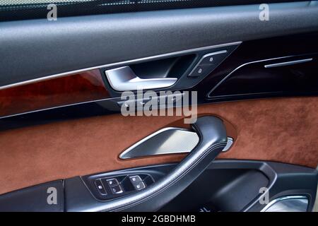 Control Button On Luxury car Door Stock Photo