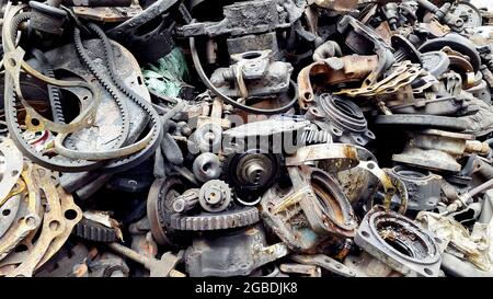 Old machine parts, spare parts, replacement parts in second hand machinery shop. Stock Photo