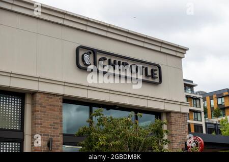 Kirkland, WA USA - circa July 2021: Low angle view of a Chipotle Mexican fast casual food establishment Stock Photo