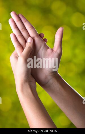 self shiatsu pressing palm for stress relief Stock Photo