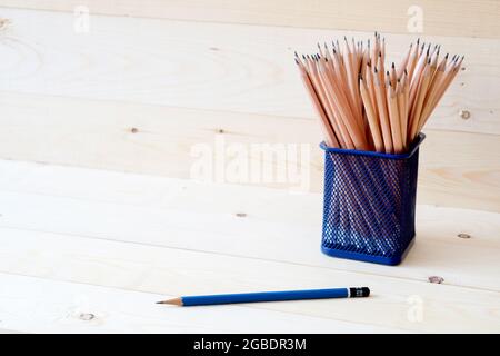 wood pencils in metal pot Stock Photo