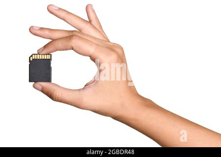 SD Card In Hand Isolated On White Background With Clipping Path Stock Photo