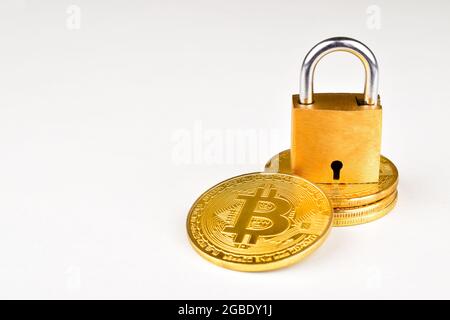 bitcoin lock concept, cryptocurrency bitcoin with padlock isolted on white background, Stock Photo