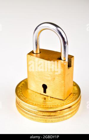 Lock With Bitcoin Isolated On White Background Stock Photo