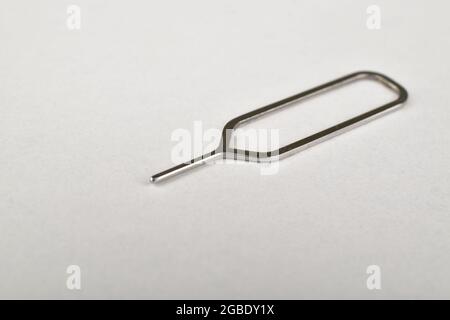 Sim Ejector Pin On White Background Stock Photo