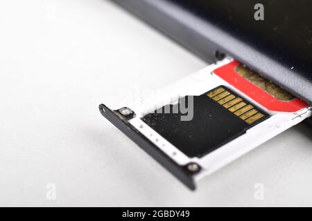 Removing Corrupt Memory Card and Sim From Smartphone Stock Photo
