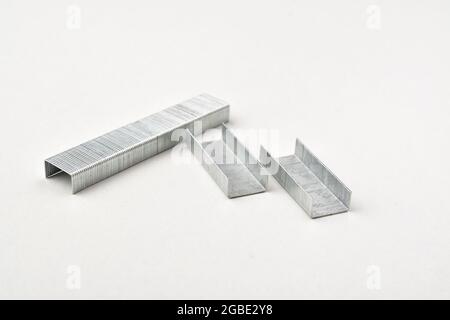 Stapler Pins On White Background Stock Photo