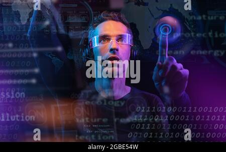 Conceptual portrait of a handsome telemarketer using new technology Stock Photo