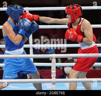 Tokyo, Kanto, Japan. 3rd Aug, 2021. Finland Olympic Team's only medal winner in 2016 Rio games, is repeating as a medal winner in 2020 Tokyo games. 'Boxer Mum' aka MIRA MARJUT JOHANNA POTKONEN, 40, edging out younger rival Turkey's ESRA YILDIZ, 24, who could be her daughters age, in a win by points 3-2 during the quarterfinal match for Women's Light (57-60kg) Boxing at the 2020 Tokyo Summer Olympics. Potkonen will face Brazil's B. Ferreira in the semifinals Thursday. Mira will be oldest lady boxer to win a medal. (Credit Image: © Scott Mc Kiernan/ZUMA Press Wire) Stock Photo