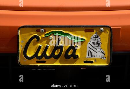A vintage decorative front license plate from Cuba on an American car in Santa Fe, New Mexico. Stock Photo