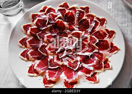 Plate of Iberian Ham Dehesa de Extremadura in the shape of a star Stock Photo