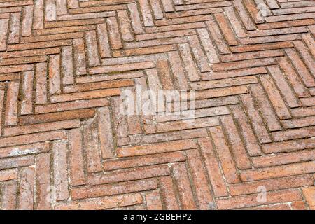 Old brick pavement in Florence, Italy.