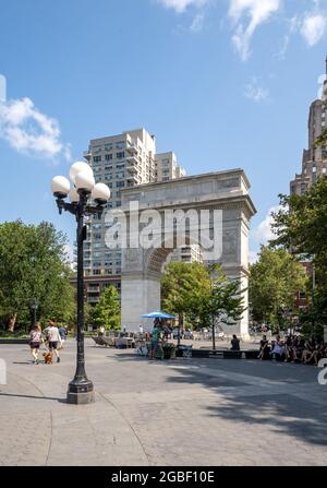 New York, NY - USA - July 30, 2011: view of Washington Square Arch located in Washington Square Park, is a public park in the Greenwich Village neighb Stock Photo