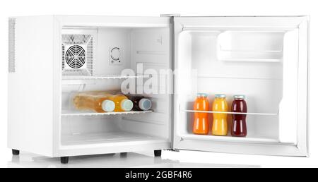 mini fridge full of bottled water isolated on white Stock Photo - Alamy