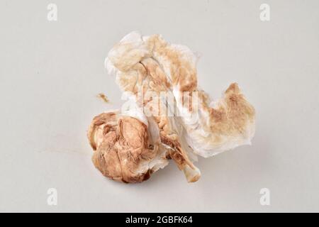 Dirty Brown Tissue Paper On White Background Stock Photo