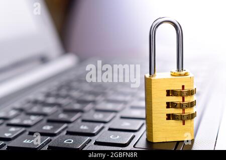 Cyber safety concept, lock on laptop, padlock on keyboard,password security concept. Stock Photo