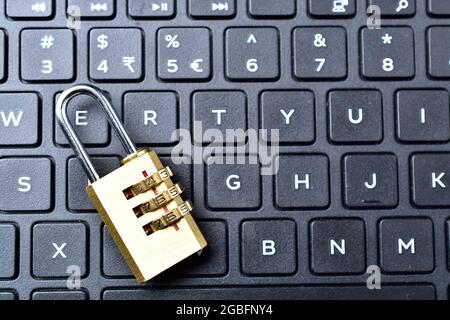 padlock on laptop computer security concept Stock Photo
