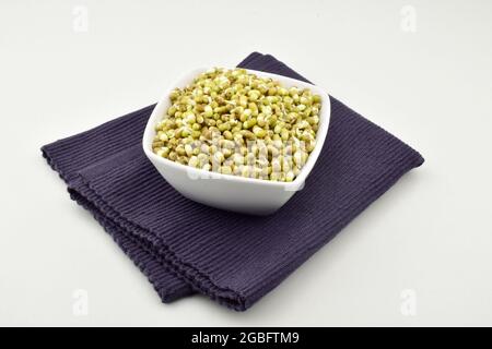 Mung bean Sprouts In Bowl isolated on white background Stock Photo