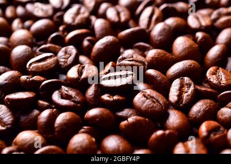 Roasted brown coffee beans pattern, background, texture Stock Photo