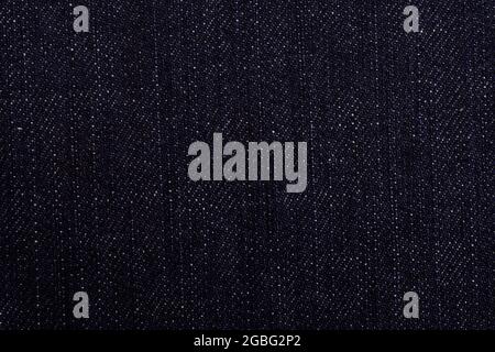 Texture Of Black Denim Jeans, detail of denim jeans Stock Photo