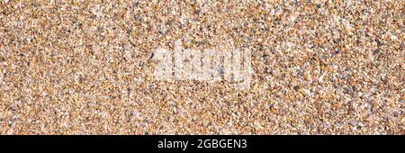Texture of stones and sand on beach area Stock Photo