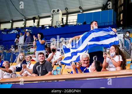 TOKYO, JAPAN - AUGUST 4: Staff, supporters of Greece celebrating victory during the Tokyo 2020 Olympic Waterpolo Tournament Men Quarterfinal match between Team Greece and Team Montenegro at Tatsumi Waterpolo Centre on August 4, 2021 in Tokyo, Japan (Photo by Marcel ter Bals/Orange Pictures) Stock Photo