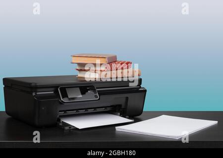 Compact home laser printer against gray background Stock Photo