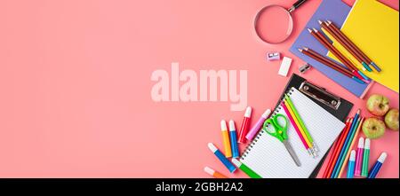 School supplies on a pink background with space for copying. Stock Photo