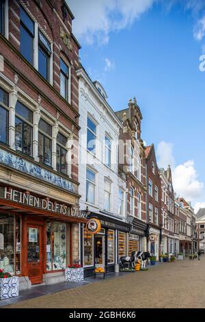 Delft Blue and cheese shop in historic building, market square Delft, the Netherlands Stock Photo