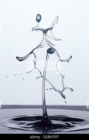 Close-Up of a water droplet and splash crown Stock Photo
