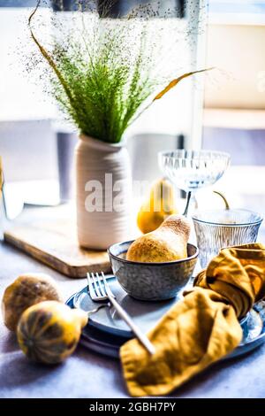 Rustic autumnal table setting with pumpkins for Thanksgiving Stock Photo